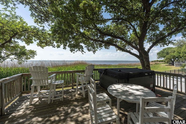 506 Magnolia Way Lot 29, Corolla, NC 27927 - wooden terrace featuring outdoor dining space and a water view