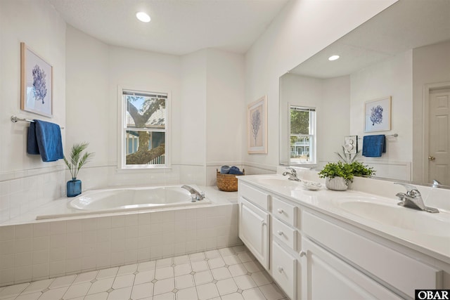 506 Magnolia Way Lot 29, Corolla, NC 27927 - full bathroom featuring healthy amount of natural light, a bath, double vanity, and recessed lighting