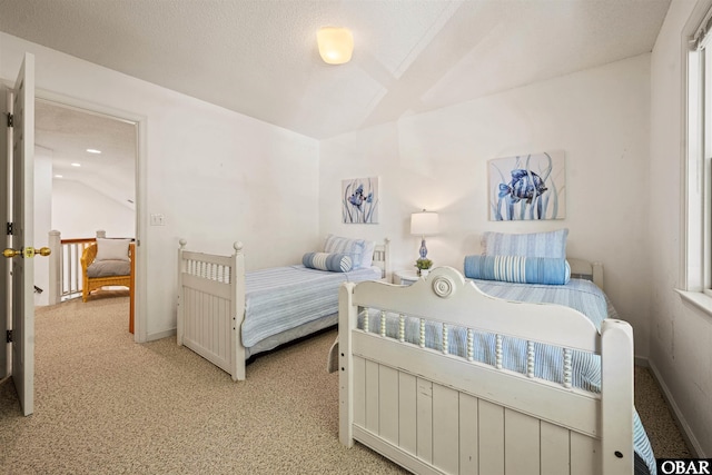 506 Magnolia Way Lot 29, Corolla, NC 27927 - bedroom with light carpet and vaulted ceiling