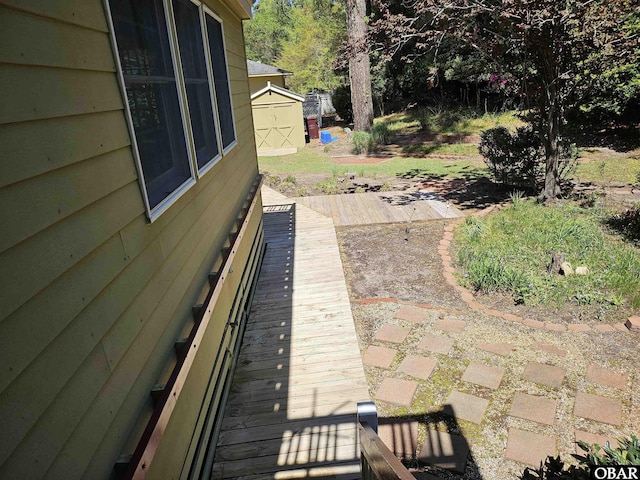 56 Deer Path Ln Lot 413, Southern Shores, NC 27949 - exterior space featuring an outbuilding and a storage unit