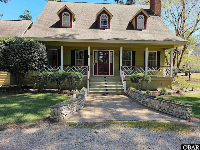 56 Deer Path Ln Lot 413, Southern Shores, NC 27949 - view of front facade featuring a chimney, crawl space, roof with shingles, and covered porch