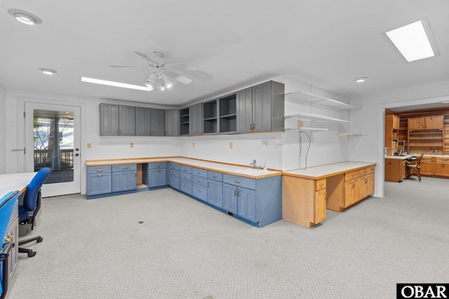 56 Deer Path Ln Lot 413, Southern Shores, NC 27949 - kitchen with a sink, open shelves, and light carpet