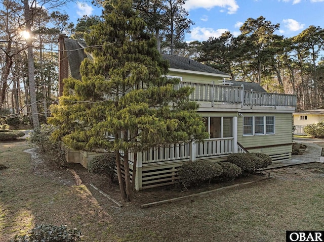 56 Deer Path Ln Lot 413, Southern Shores, NC 27949 - back of house featuring a chimney, a shingled roof, and a deck