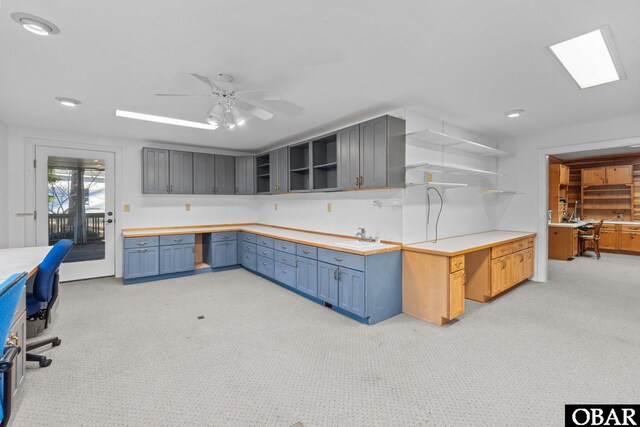 56 Deer Path Ln Lot 413, Southern Shores, NC 27949 - kitchen with a sink, open shelves, and light carpet