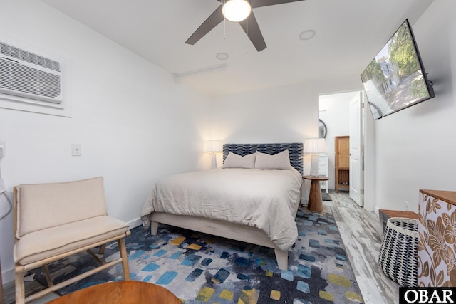24 First Ave Lot # 14, Southern Shores, NC 27949 - bedroom with a ceiling fan, a wall mounted air conditioner, and wood finished floors