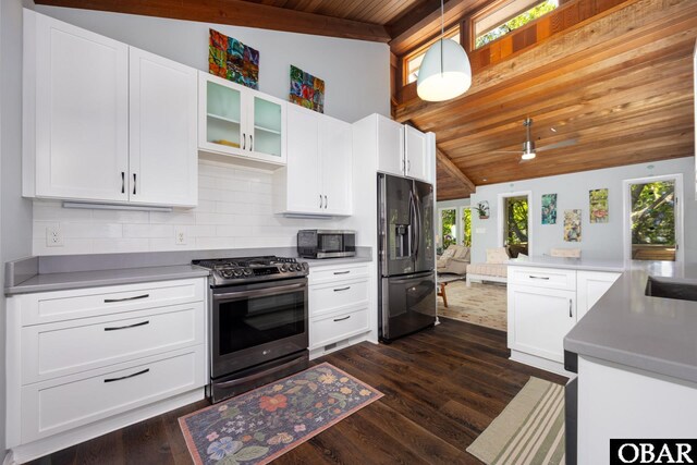 24 First Ave Lot # 14, Southern Shores, NC 27949 - kitchen featuring appliances with stainless steel finishes, white cabinetry, decorative light fixtures, tasteful backsplash, and wood ceiling