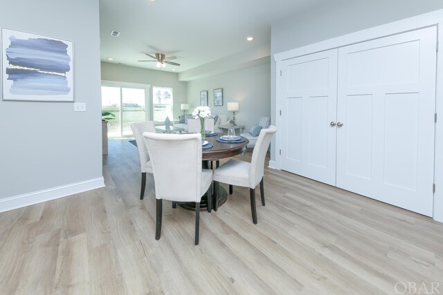 dining room with recessed lighting, light wood-type flooring, visible vents, and baseboards