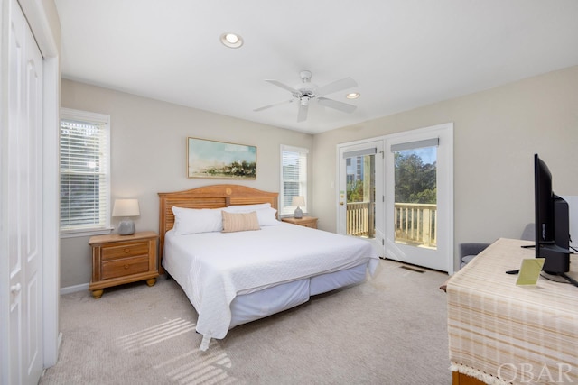 bedroom with ceiling fan, recessed lighting, light carpet, visible vents, and access to outside