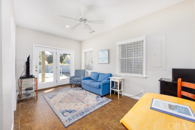 office with french doors, dark tile patterned floors, a ceiling fan, and recessed lighting