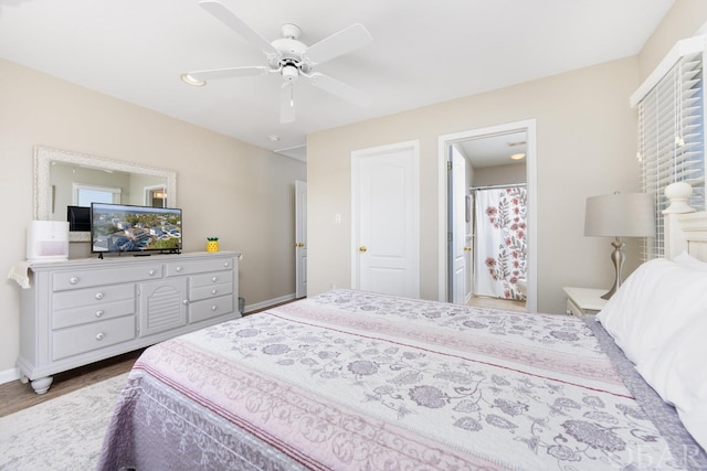 bedroom featuring ceiling fan, wood finished floors, and baseboards