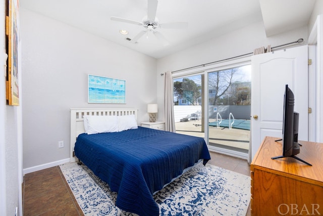 bedroom featuring access to exterior, ceiling fan, and baseboards