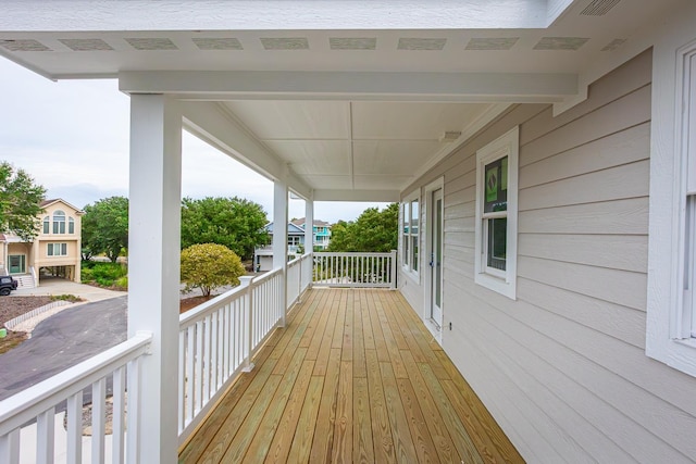 wooden terrace featuring a porch