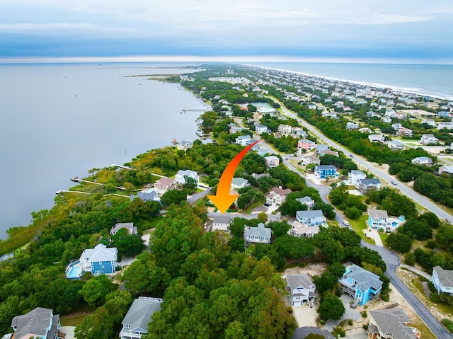 aerial view featuring a residential view and a water view