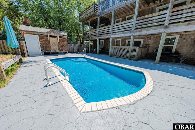 102 Settlers Ln Lot 7R, Duck, NC 27949 - view of swimming pool featuring a patio area and an outbuilding