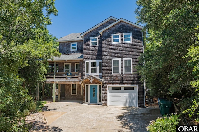 102 Settlers Ln Lot 7R, Duck, NC 27949 - shingle-style home with concrete driveway, a garage, and a balcony