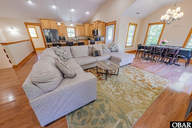 102 Settlers Ln Lot 7R, Duck, NC 27949 - living area featuring a chandelier, vaulted ceiling, light wood-style flooring, and recessed lighting