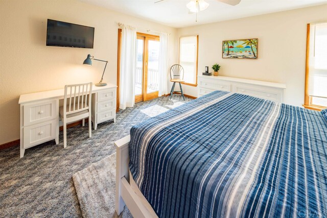 carpeted bedroom featuring ceiling fan and baseboards