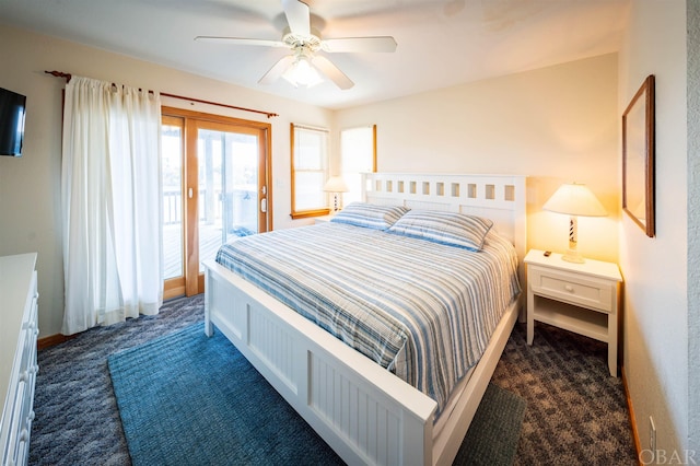 bedroom with dark carpet, a ceiling fan, and access to exterior