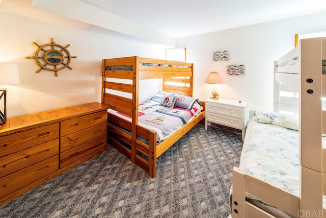 bedroom with dark carpet