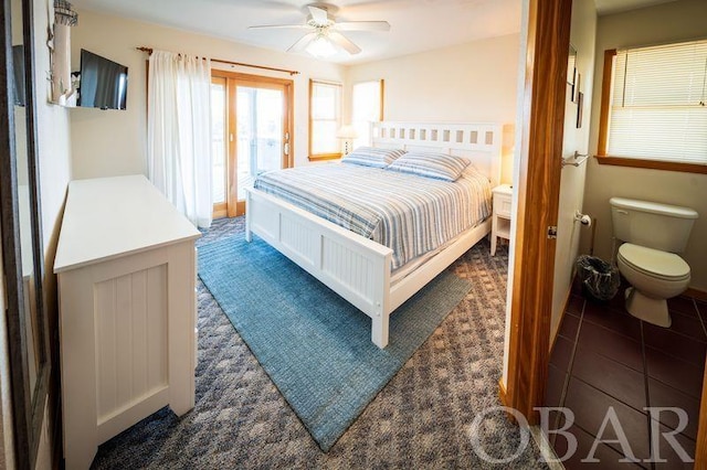 bedroom featuring access to exterior and ceiling fan