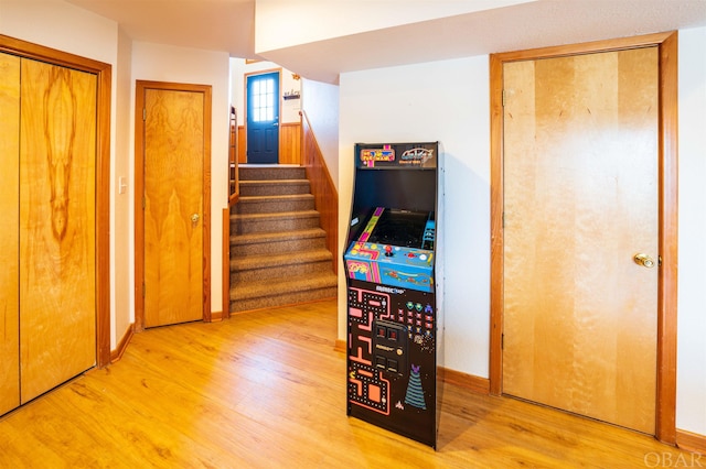 stairs with wood finished floors