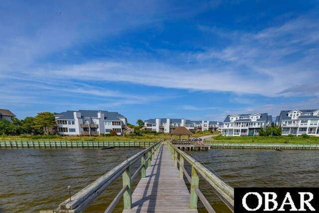 131B Jay Crest Rd Unit 801, Duck, NC 27949 - dock featuring a water view and a residential view