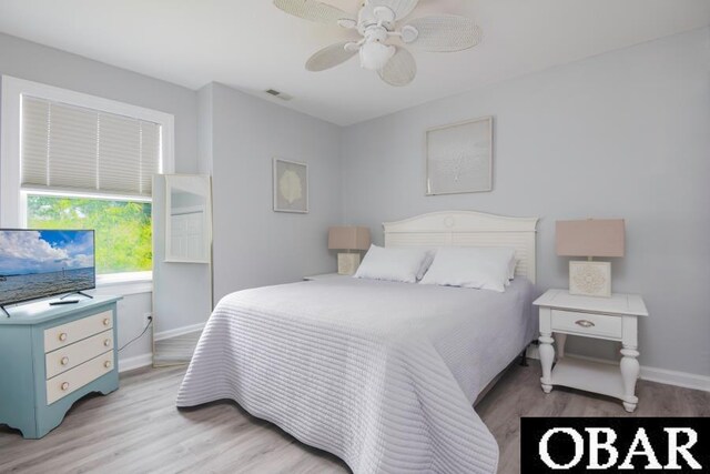 131B Jay Crest Rd Unit 801, Duck, NC 27949 - bedroom featuring light wood-style flooring and a ceiling fan