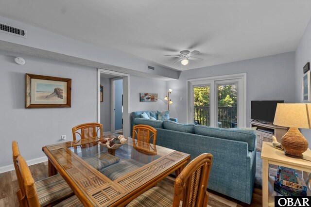 627 Sand Fiddler Cir Unit B-1, Corolla, NC 27927 - dining area featuring wood finished floors and ceiling fan