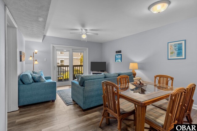 627 Sand Fiddler Cir Unit B-1, Corolla, NC 27927 - dining room featuring ceiling fan and wood finished floors