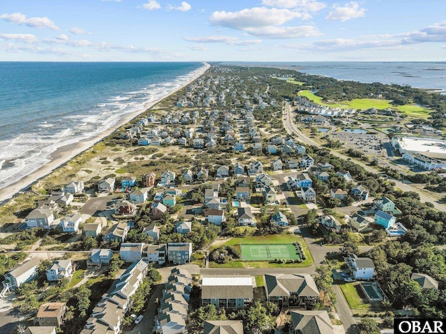 627 Sand Fiddler Cir Unit B-1, Corolla, NC 27927 - aerial view of property and surrounding area featuring expansive beach and nearby suburban area