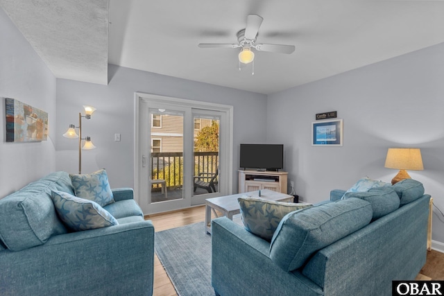 627 Sand Fiddler Cir Unit B-1, Corolla, NC 27927 - living area with a ceiling fan and wood finished floors
