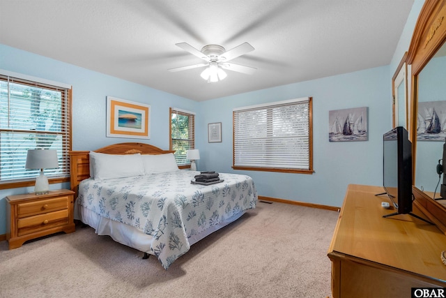 757 Fishermans Ct Lot 66, Corolla, NC 27927 - bedroom featuring baseboards, light carpet, and a ceiling fan