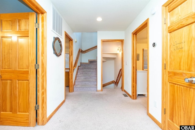 757 Fishermans Ct Lot 66, Corolla, NC 27927 - hall with stairs, baseboards, visible vents, and carpet floors