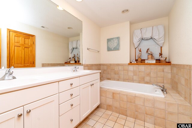 757 Fishermans Ct Lot 66, Corolla, NC 27927 - full bath with tile patterned flooring, double vanity, a bath, and a sink