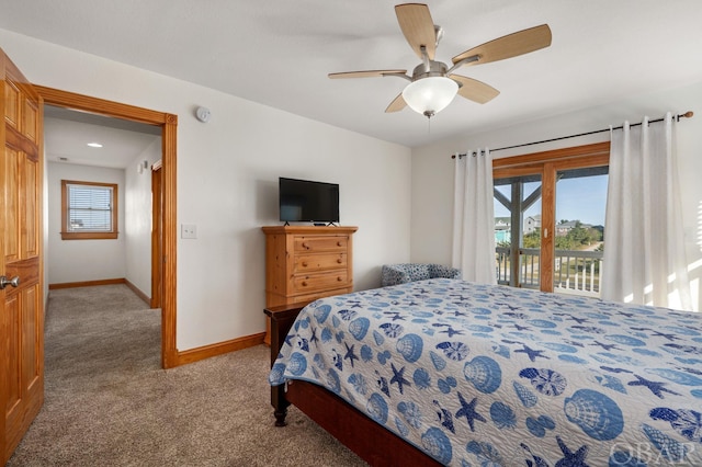 bedroom with access to exterior, ceiling fan, baseboards, and light colored carpet