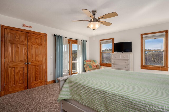 bedroom with carpet floors, access to outside, and a ceiling fan