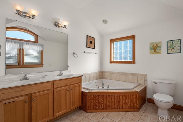 full bath featuring lofted ceiling, plenty of natural light, tile patterned flooring, and a sink