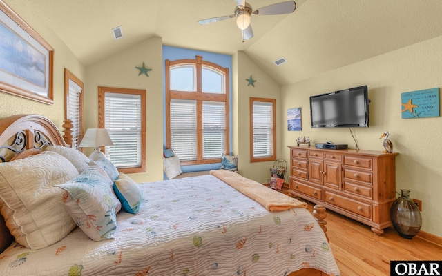 2132 Dolphin Ln Lot 62, Corolla, NC 27927 - bedroom featuring lofted ceiling, light wood-type flooring, and ceiling fan