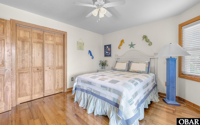 2132 Dolphin Ln Lot 62, Corolla, NC 27927 - bedroom with light wood-style floors, ceiling fan, and a closet
