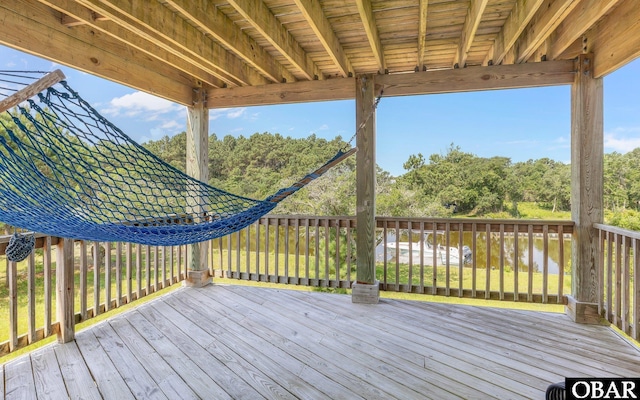 2132 Dolphin Ln Lot 62, Corolla, NC 27927 - wooden terrace featuring view of wooded area