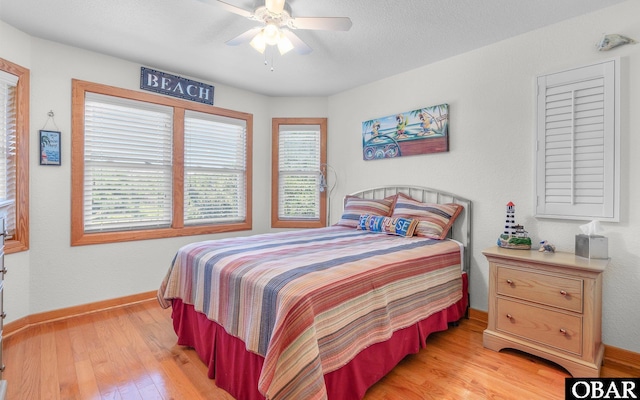 2132 Dolphin Ln Lot 62, Corolla, NC 27927 - bedroom featuring light wood-style floors and ceiling fan