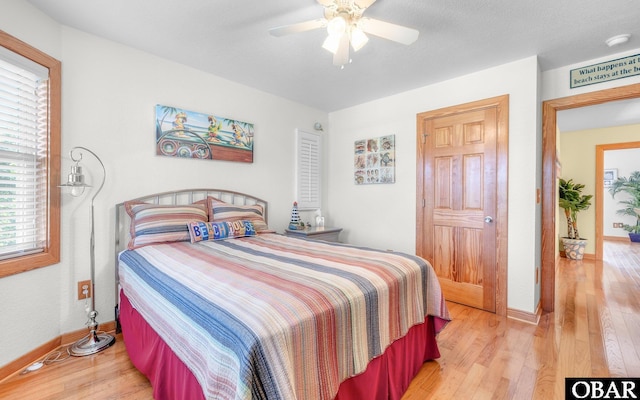 2132 Dolphin Ln Lot 62, Corolla, NC 27927 - bedroom with light wood finished floors and a ceiling fan