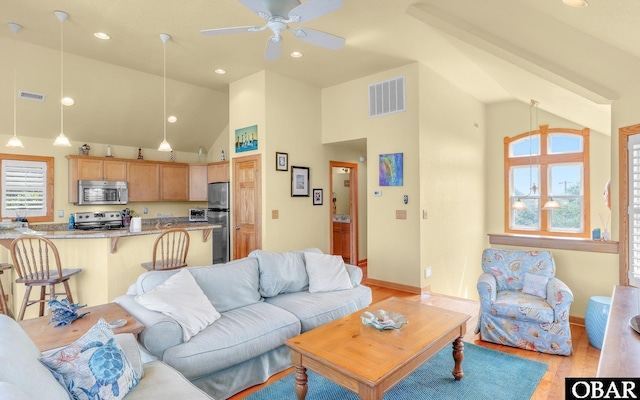 2132 Dolphin Ln Lot 62, Corolla, NC 27927 - living room with high vaulted ceiling, light wood-type flooring, ceiling fan, and recessed lighting