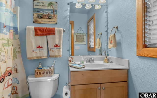 2132 Dolphin Ln Lot 62, Corolla, NC 27927 - full bathroom featuring vanity and a textured wall