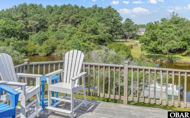 2132 Dolphin Ln Lot 62, Corolla, NC 27927 - wooden terrace featuring a water view