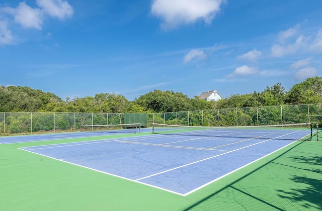 view of sport court featuring community basketball court and fence