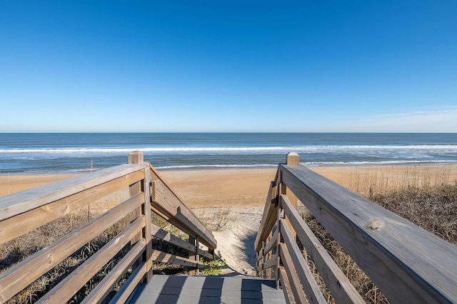 view of home's community with a view of the beach and a water view