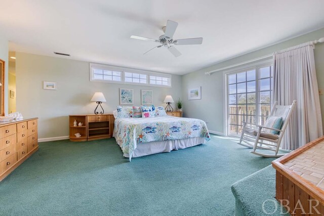 bedroom featuring baseboards, visible vents, dark carpet, and a ceiling fan