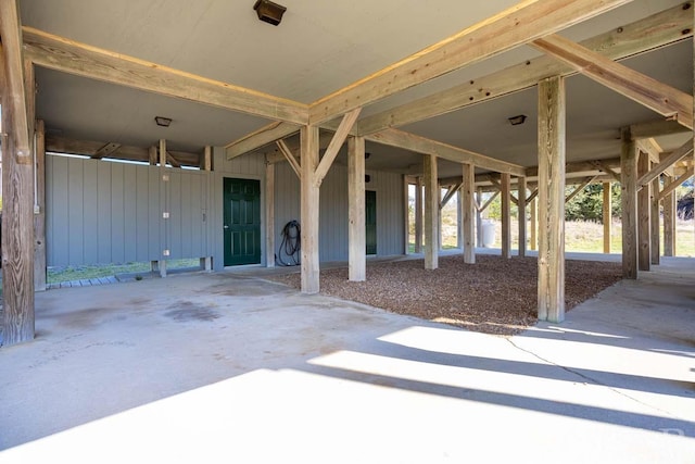 view of patio featuring concrete driveway