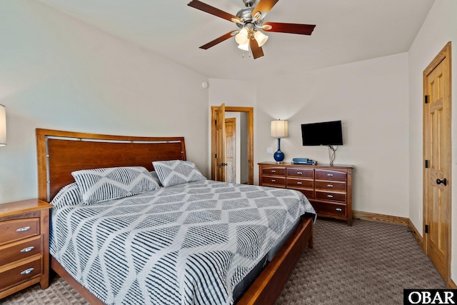 carpeted bedroom with ceiling fan and baseboards